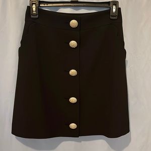 Scallop pocket A-line skirt